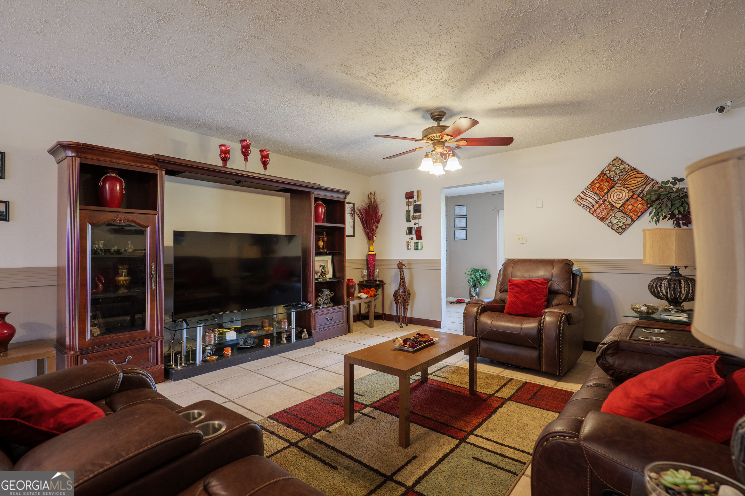 3473 Kay Circle Valdosta, GA 31606 - Photo 61 of 79 a living room with furniture and a flat screen tv