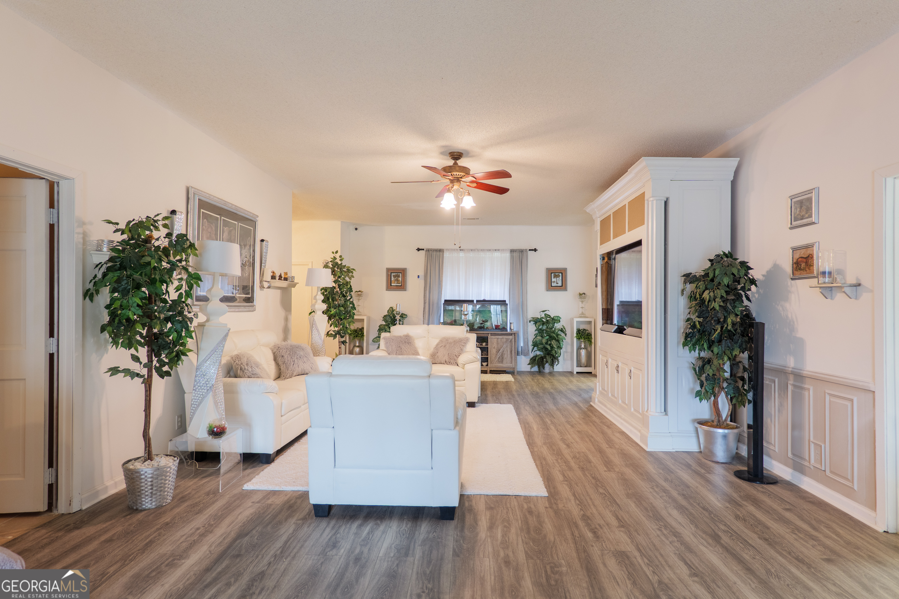 3473 Kay Circle Valdosta, GA 31606 - Photo 8 of 79 a living room with furniture a potted plant and a fireplace