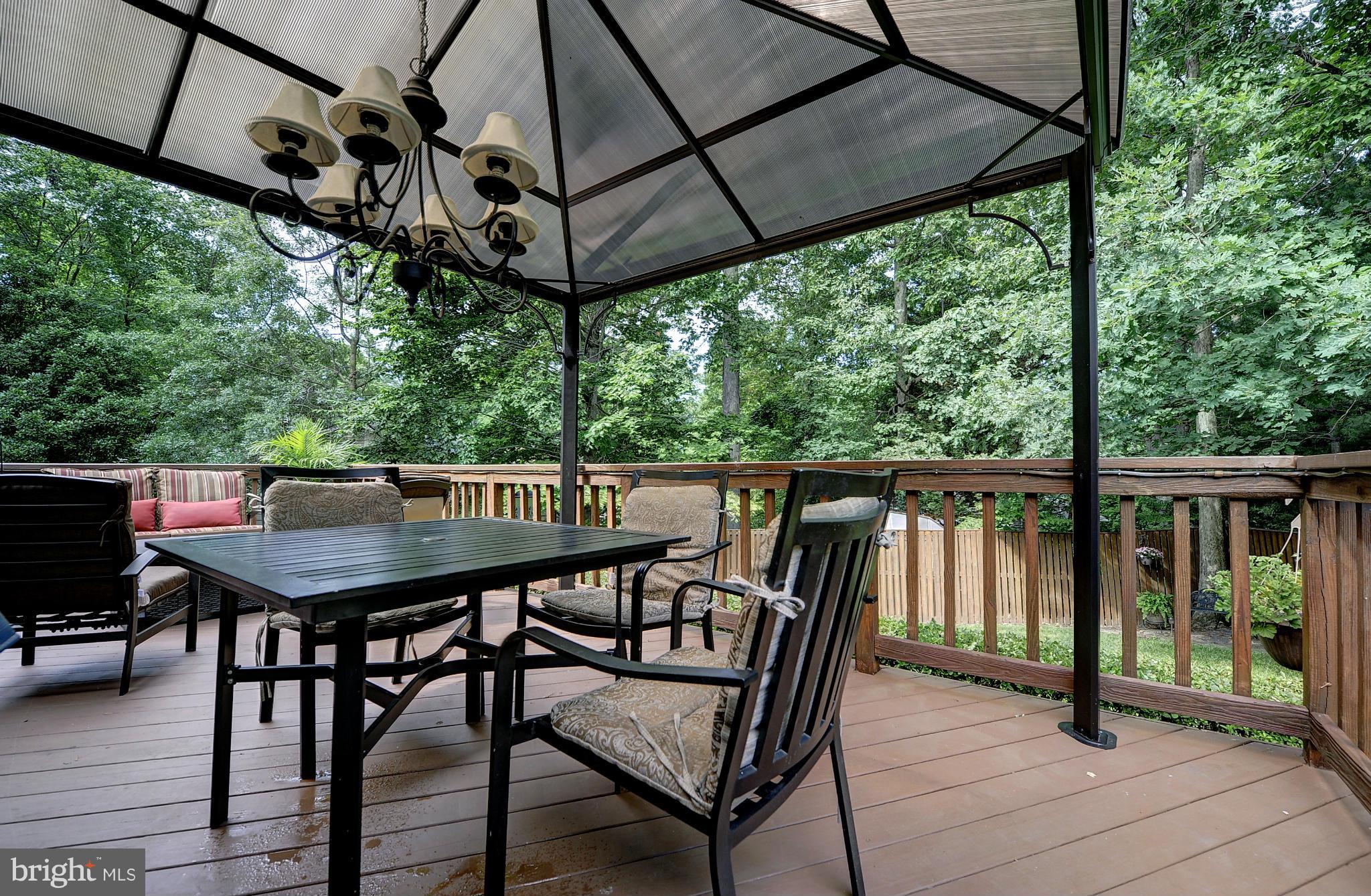 8609 Woodview Drive Springfield, VA 22153 - Photo 2 of 28 a view of a balcony with furniture