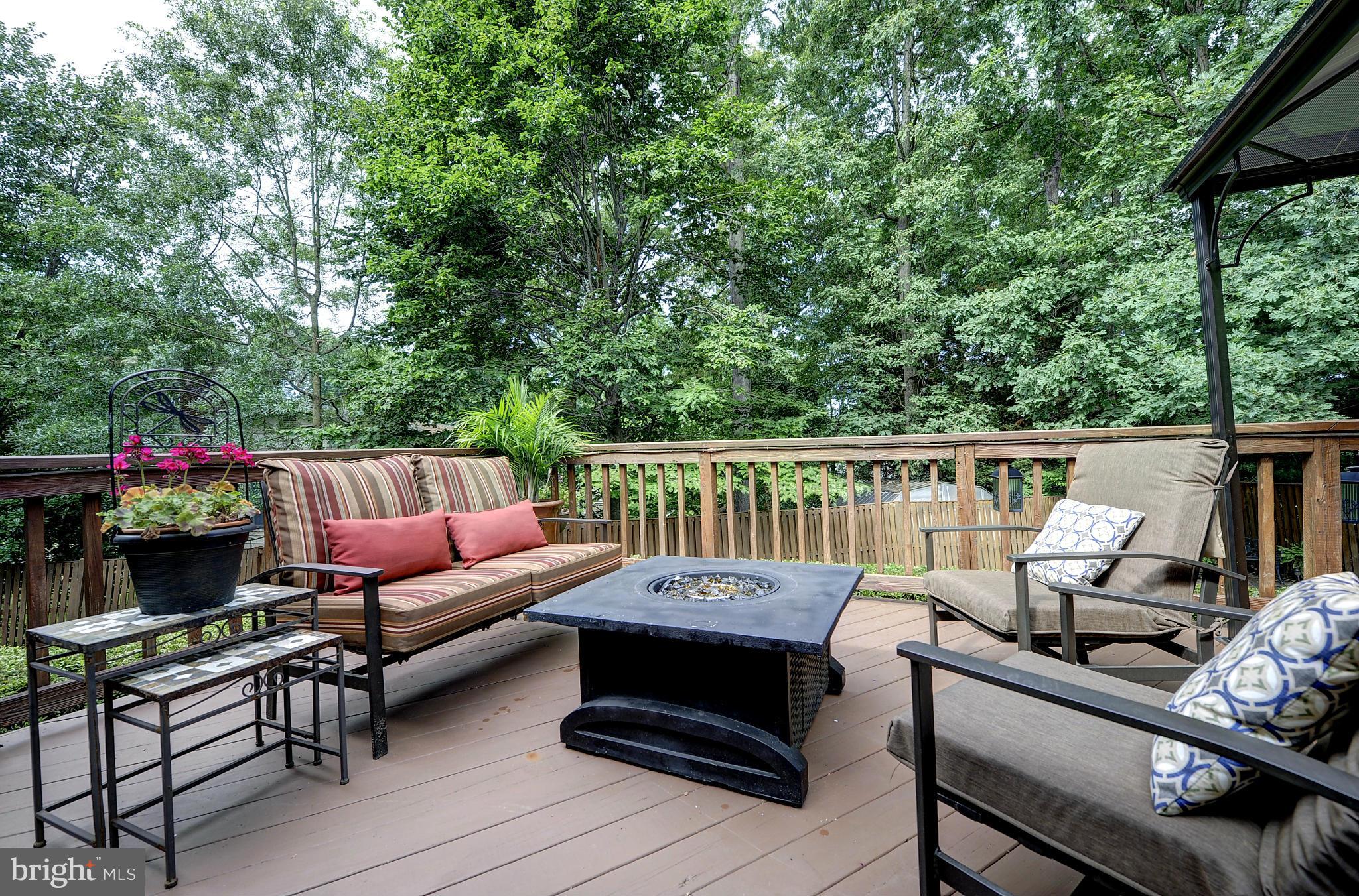 8609 Woodview Drive Springfield, VA 22153 - Photo 3 of 28 a view of a roof deck with furniture
