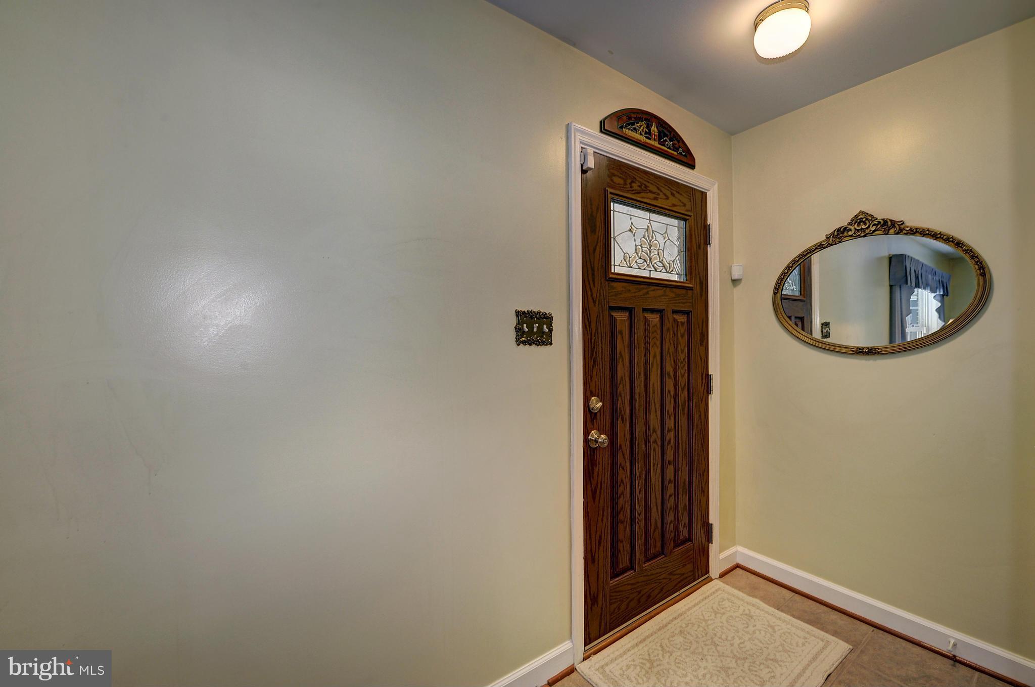 8609 Woodview Drive Springfield, VA 22153 - Photo 7 of 28 a bathroom with a sink and a mirror