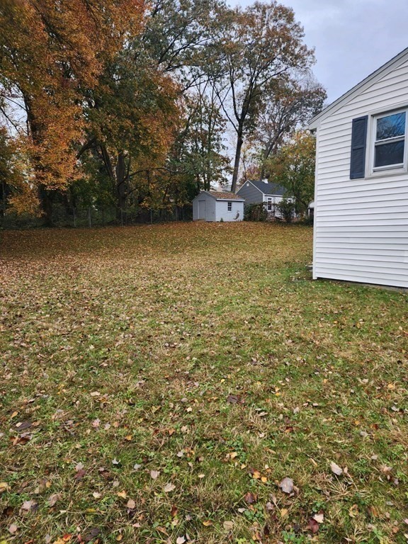 76 Bradley Rd Extension Braintree, MA 02184 - Photo 18 of 19 a view of yard with trees