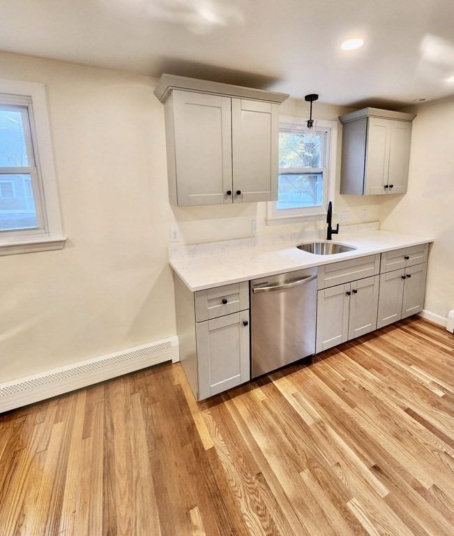 76 Bradley Rd Extension Braintree, MA 02184 - Photo 7 of 19 a spacious bathroom with a sink and a mirror