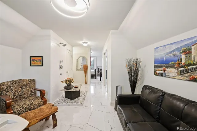 a bedroom with a bed and a fireplace