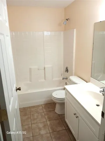 a bathroom with a sink a toilet and a bathtub