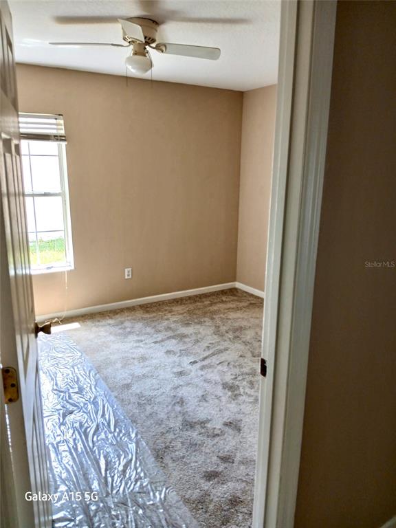 28 Plateau Lane, Unit B Palm Coast, FL 32164 - Photo 6 of 7 a view of an empty room