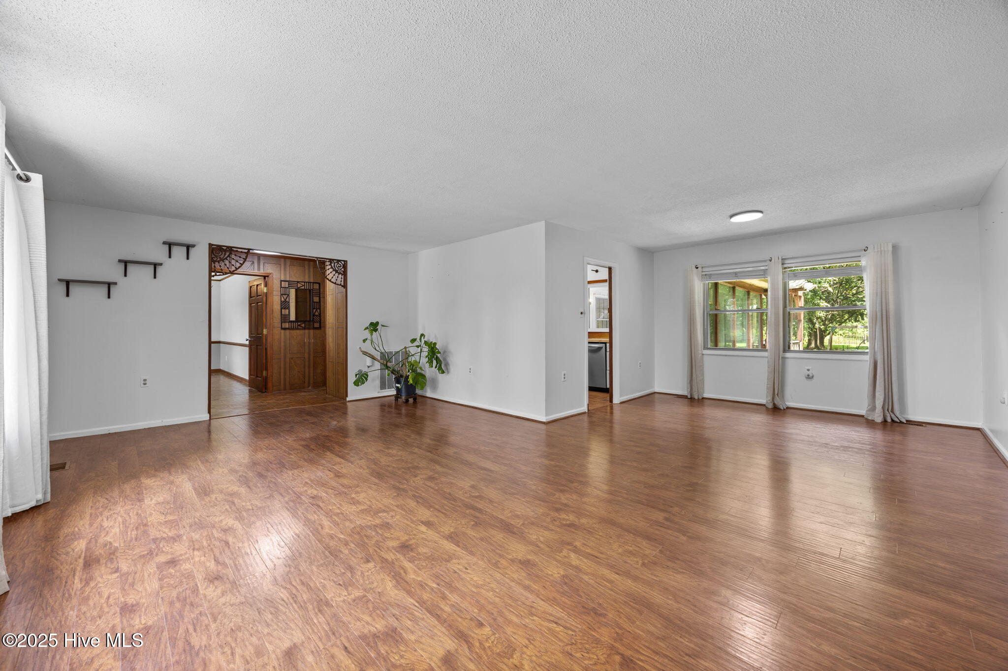 1413 Bud Hawkins Road Dunn, NC 28334 - Photo 13 of 56 Living room is open to dining area or breakfast area.