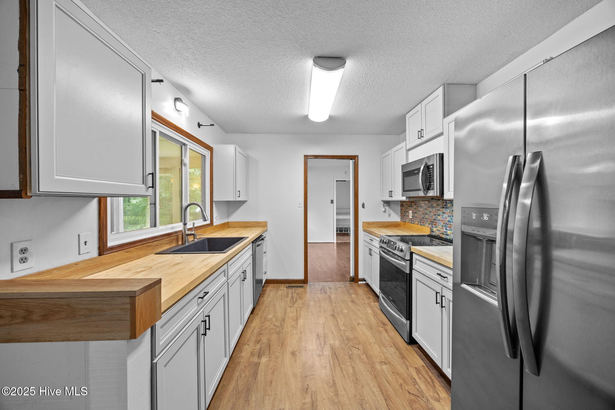 1413 Bud Hawkins Road Dunn, NC 28334 - Photo 17 of 56 Updated Kitchen...appliances convey.