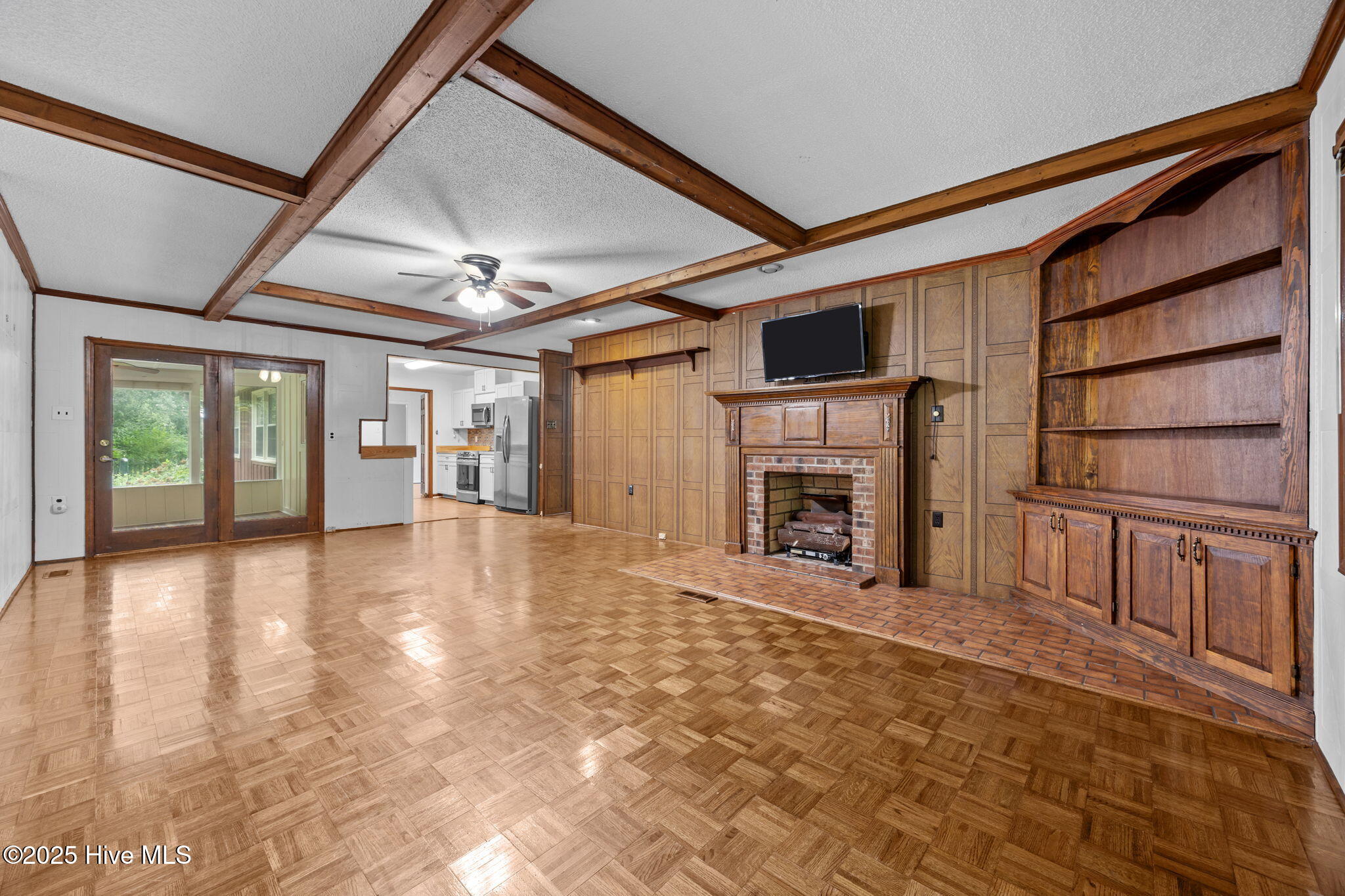 1413 Bud Hawkins Road Dunn, NC 28334 - Photo 22 of 56 family room to kitchen and sunroom