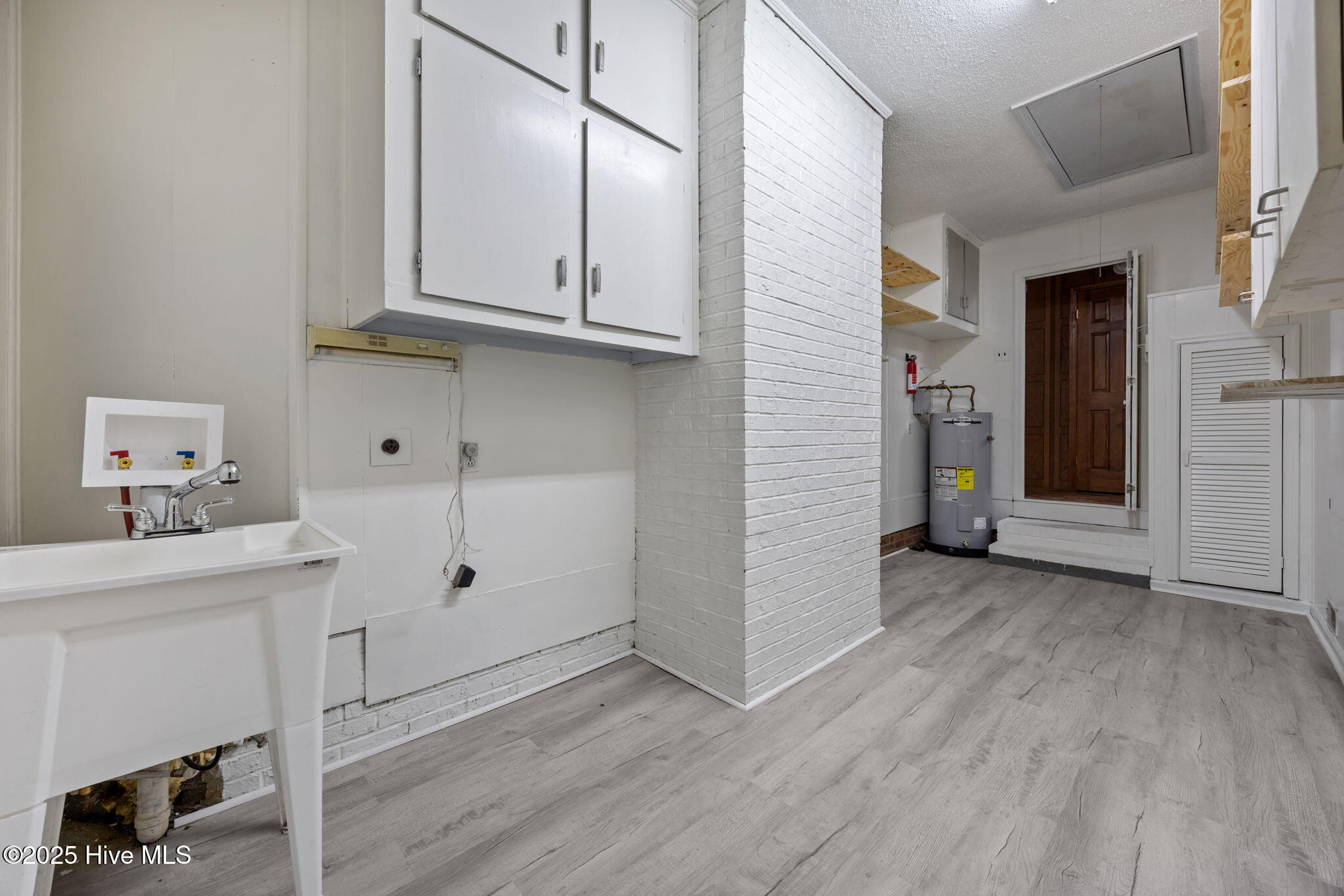 1413 Bud Hawkins Road Dunn, NC 28334 - Photo 36 of 56 Lots of storage in laundry room.