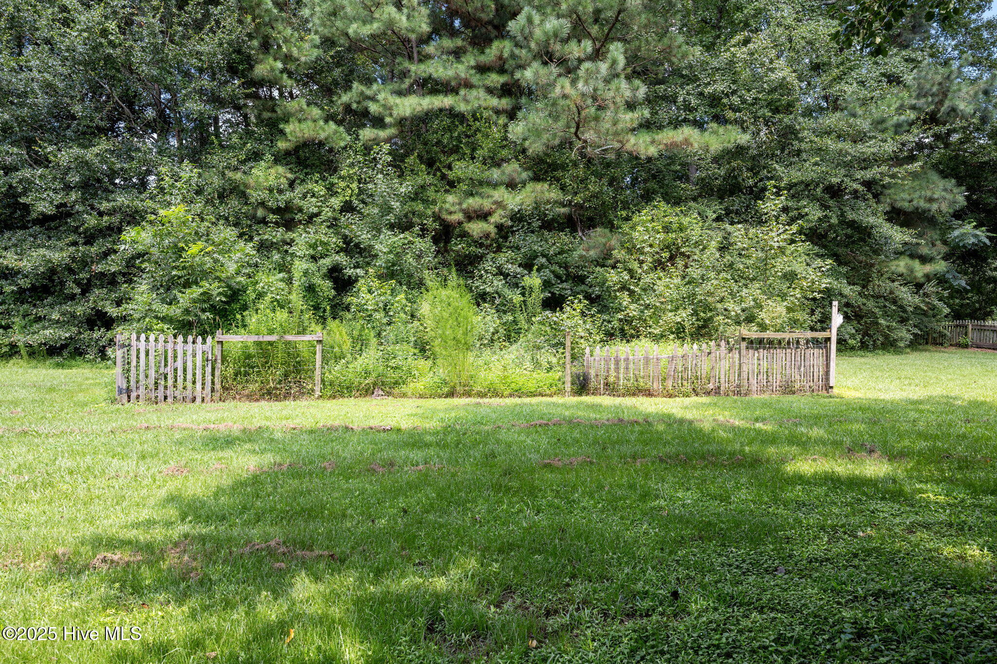 1413 Bud Hawkins Road Dunn, NC 28334 - Photo 45 of 56 garden fence in