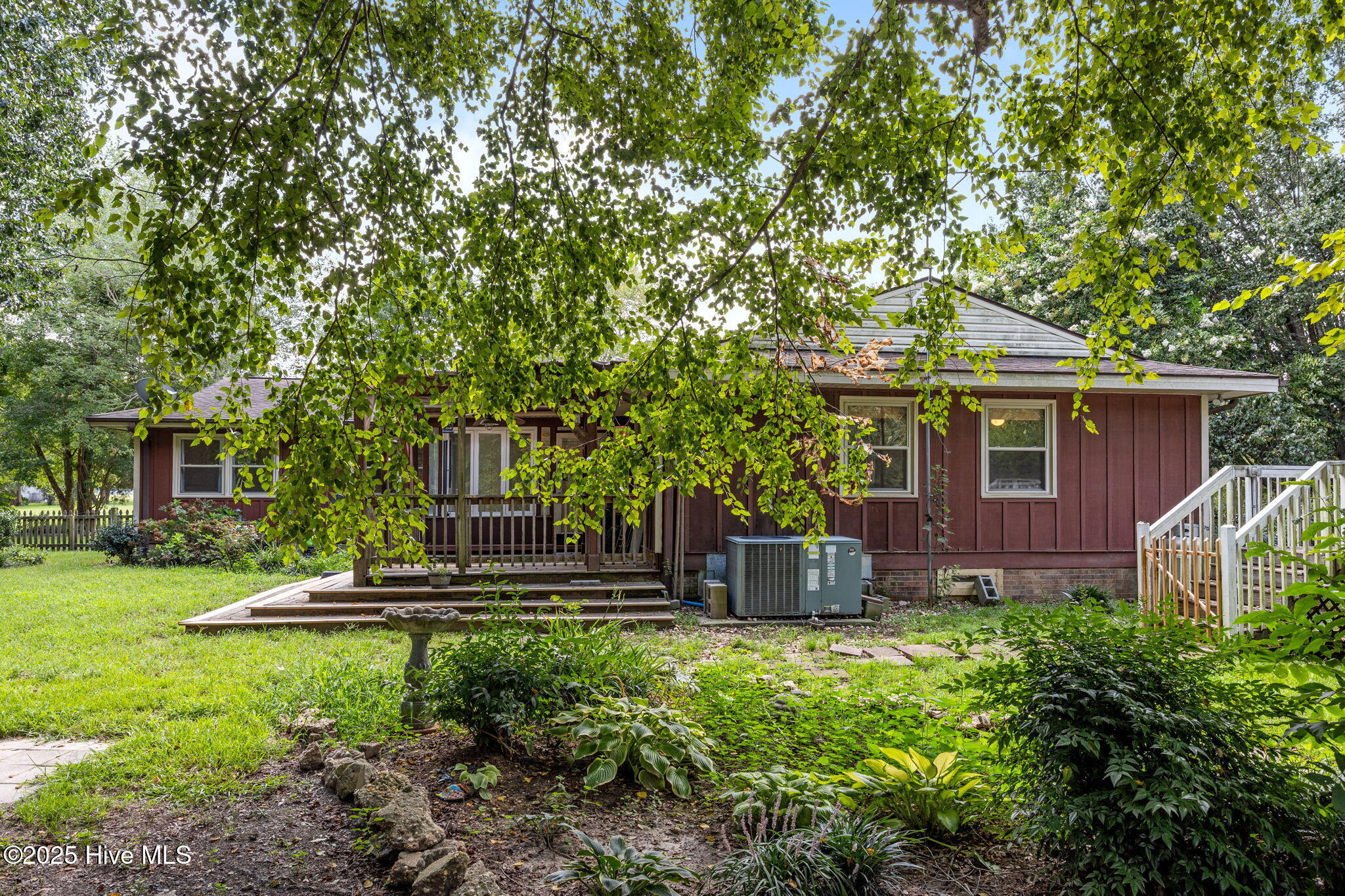 1413 Bud Hawkins Road Dunn, NC 28334 - Photo 46 of 56 Rear of home. Love the outdoors here.