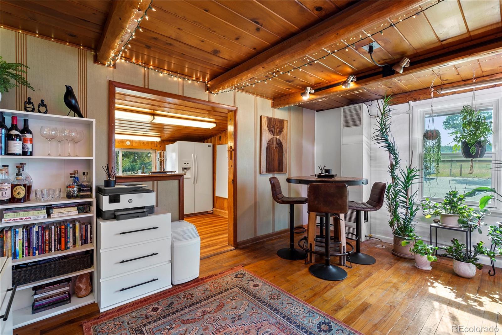 21852 Pleasant Park Road Conifer, CO 80433 - Photo 23 of 47 a view of a workspace with furniture