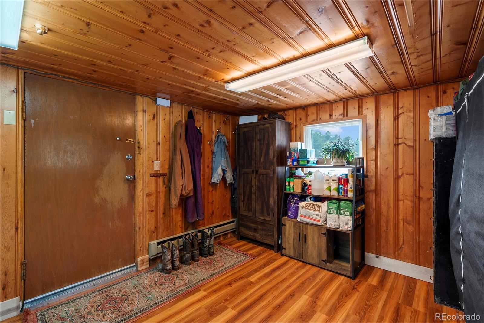 21852 Pleasant Park Road Conifer, CO 80433 - Photo 28 of 47 a view of a room with storage and utility room