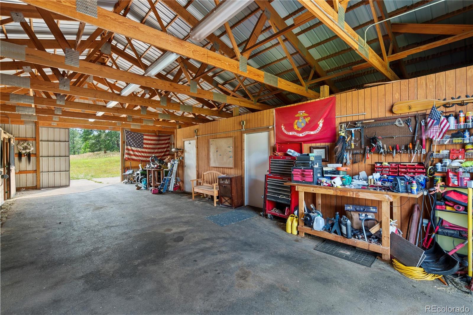 21852 Pleasant Park Road Conifer, CO 80433 - Photo 34 of 47 a view of storage and utility room