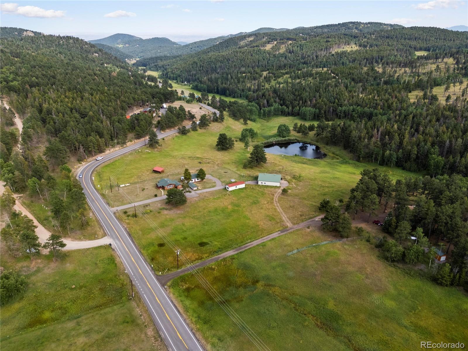 21852 Pleasant Park Road Conifer, CO 80433 - Photo 46 of 47 a view of a pool from a balcony