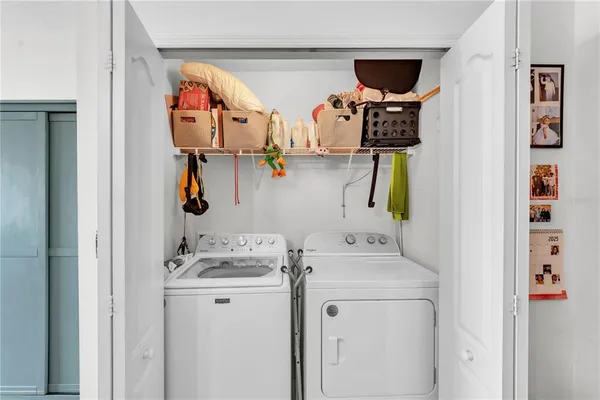 a utility room with dryer and washer