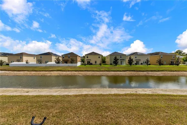 a view of a lake with houses