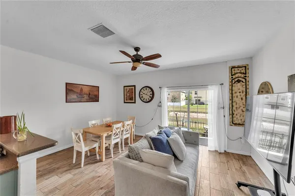 a living room with furniture and a window