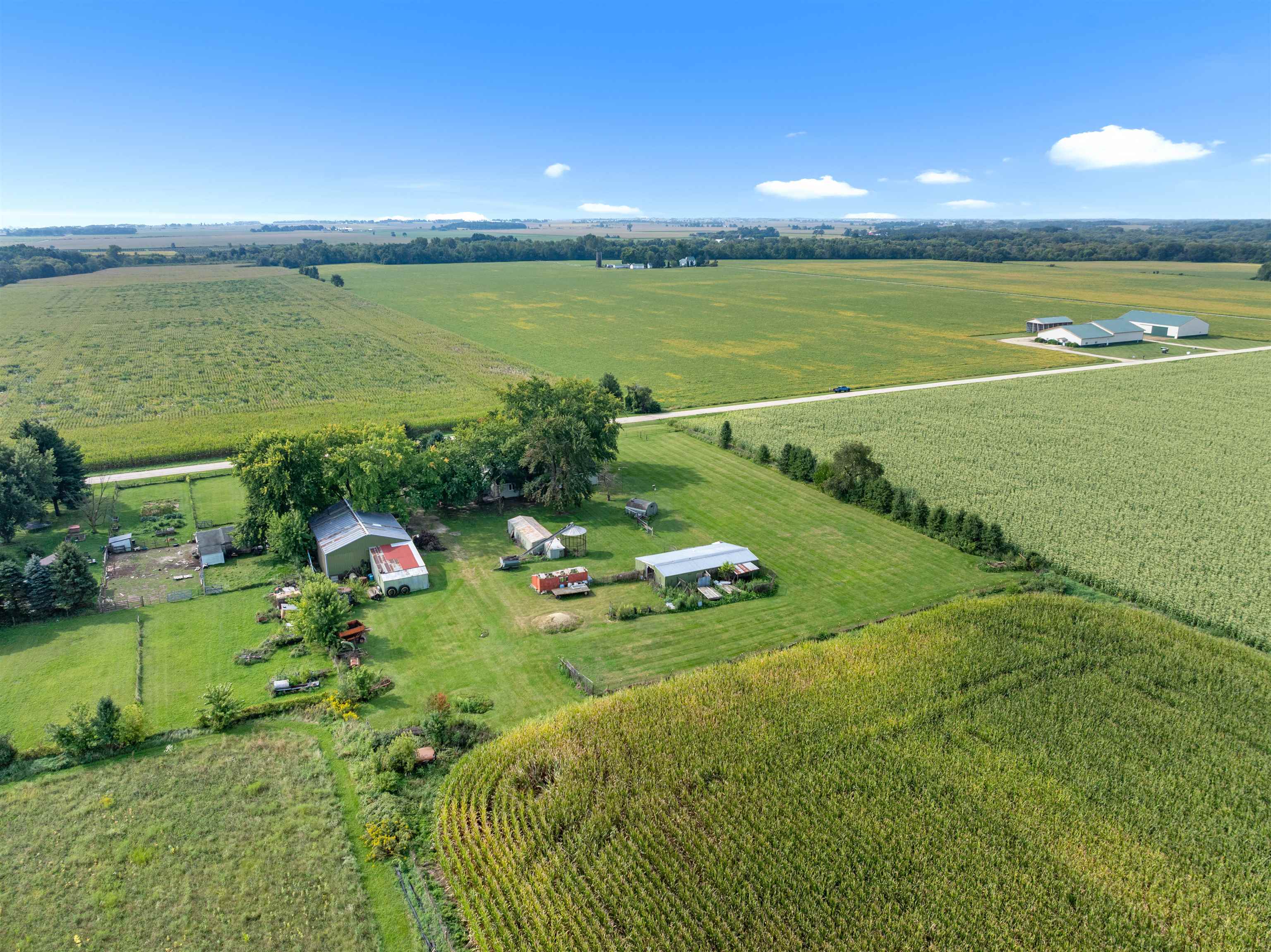 11754 Wange Road Capron, IL 61012 - Photo 18 of 19 a view of a lake with a big yard