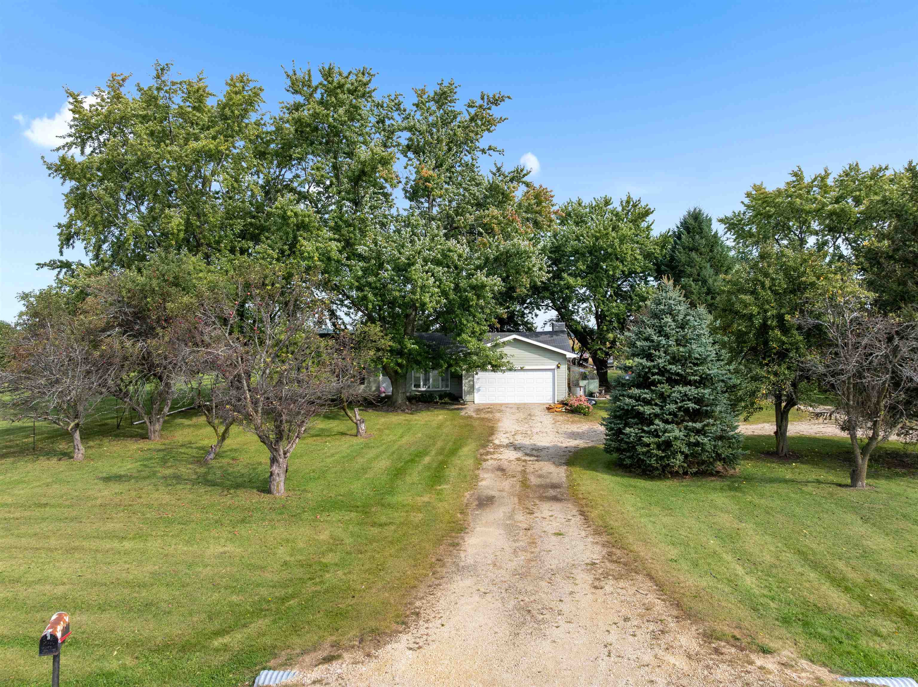 11754 Wange Road Capron, IL 61012 - Photo 2 of 19 a view of a yard with a tree