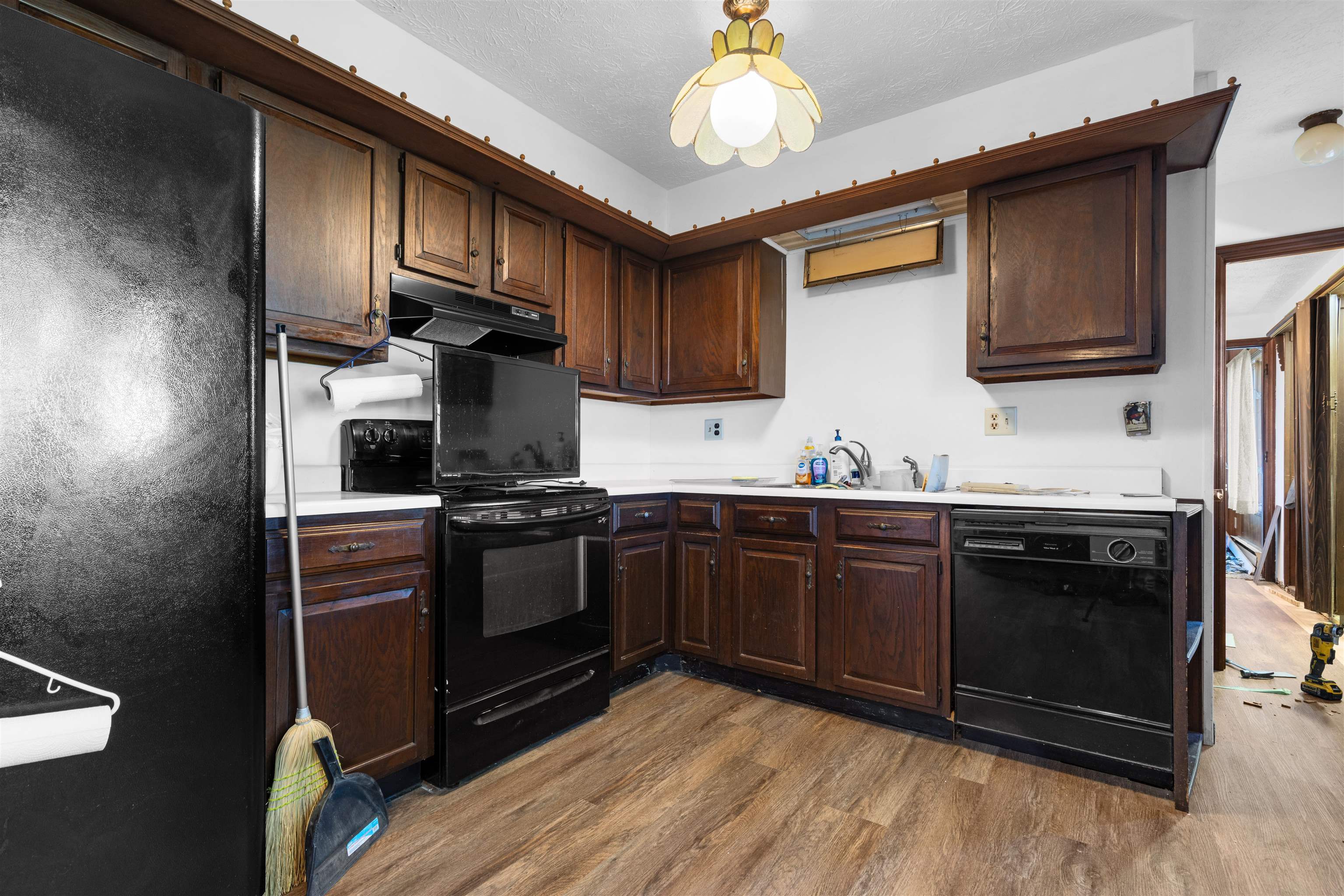 11754 Wange Road Capron, IL 61012 - Photo 6 of 19 a kitchen with stainless steel appliances granite countertop a stove sink and cabinets