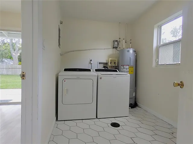 a view of a garage with rack and bicycle