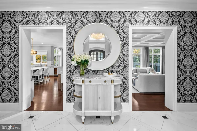a view of living room with furniture and fireplace