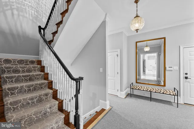 a utility room with sink dryer and washer
