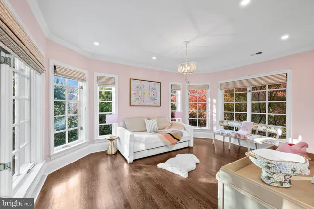 a bed room with a bed and a window