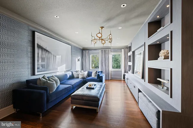 a bed room with furniture and a window