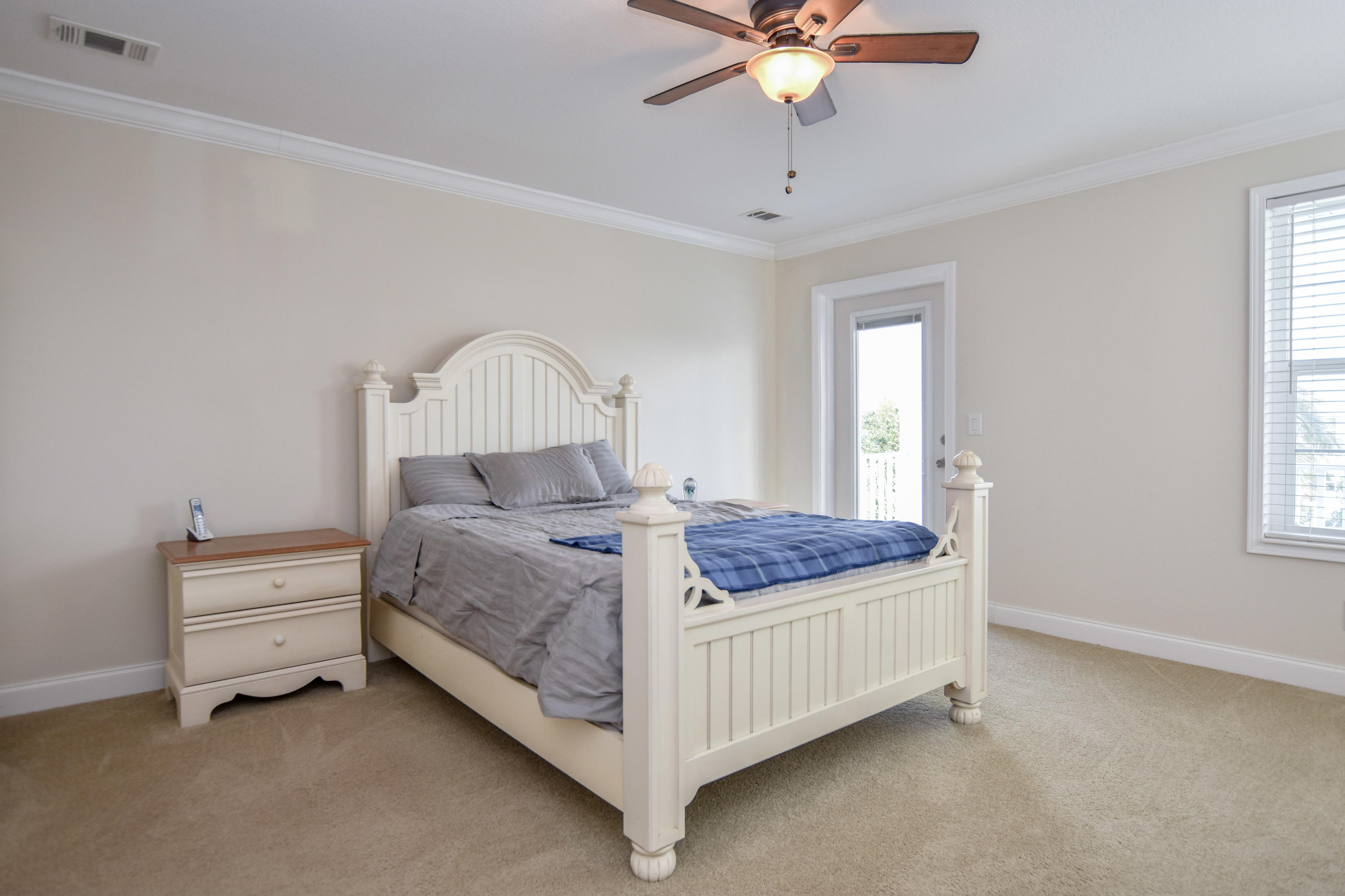 37 Palm Drive Key West, FL 33040 - Photo 12 of 24 a bed room with a bed and window