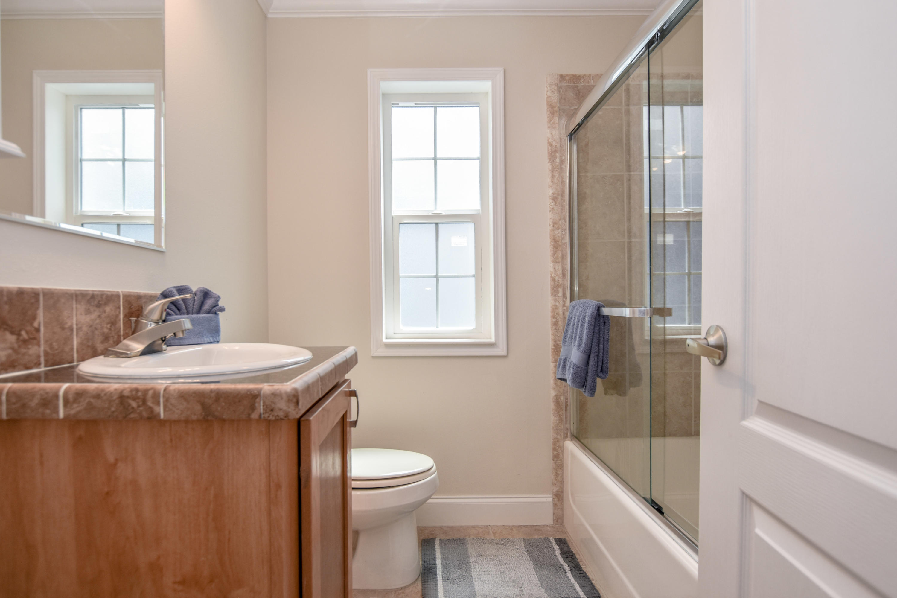 37 Palm Drive Key West, FL 33040 - Photo 13 of 24 a bathroom with a sink a toilet and shower