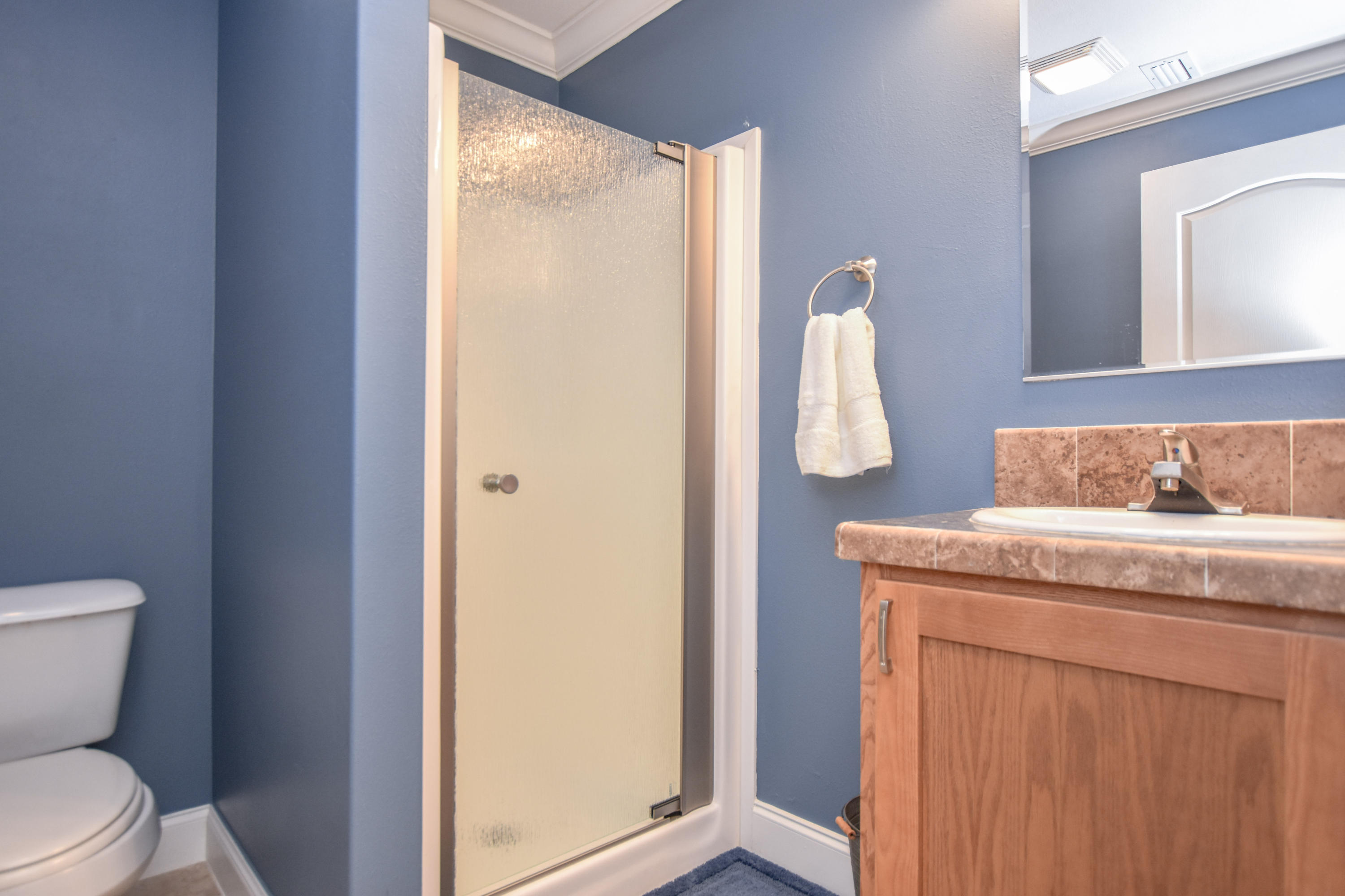 37 Palm Drive Key West, FL 33040 - Photo 18 of 24 a bathroom with a granite countertop sink and toilet