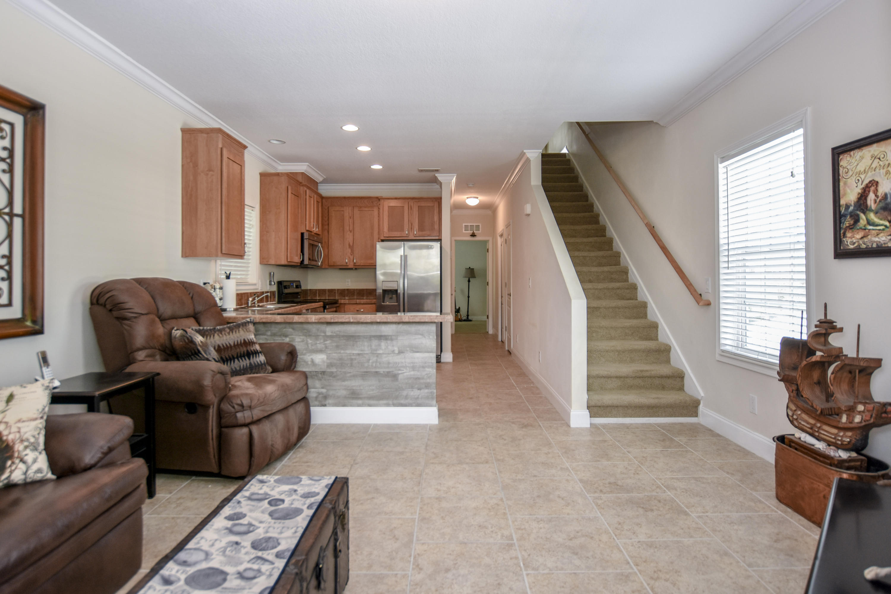 37 Palm Drive Key West, FL 33040 - Photo 24 of 24 a living room with furniture and a fireplace