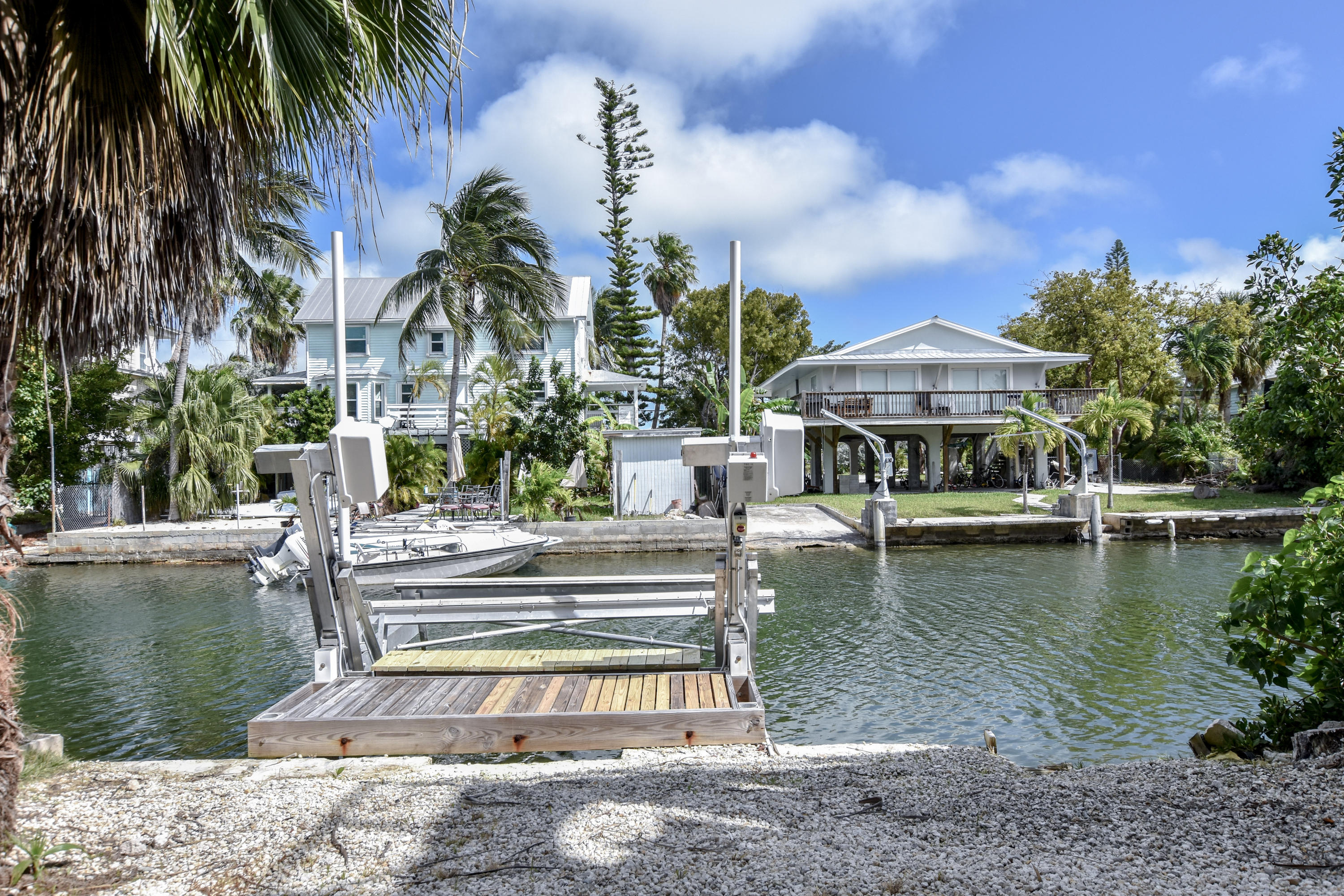 37 Palm Drive Key West, FL 33040 - Photo 21 of 24 a view of a water pond with palm trees