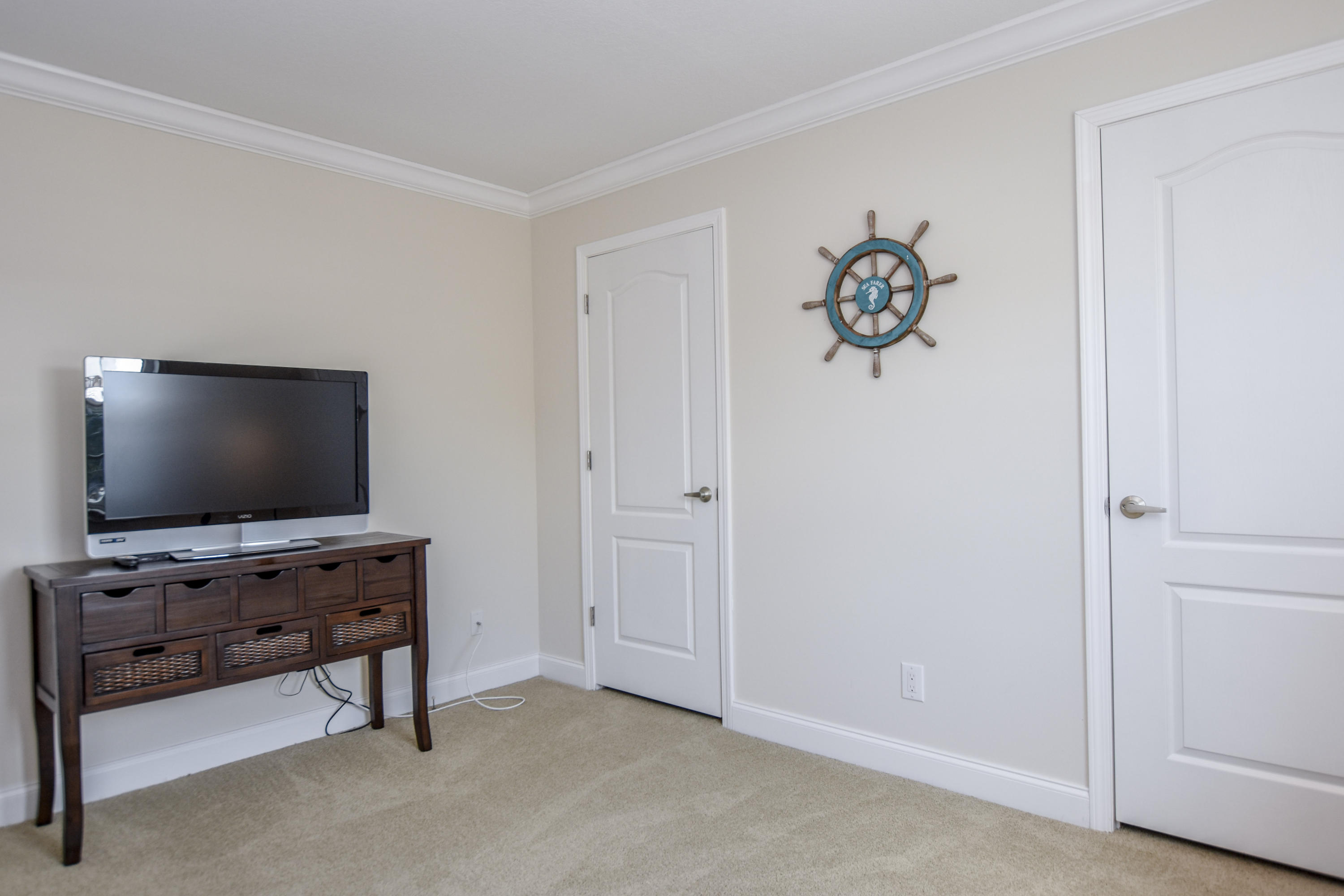 37 Palm Drive Key West, FL 33040 - Photo 9 of 24 a living room with furniture and a flat screen tv