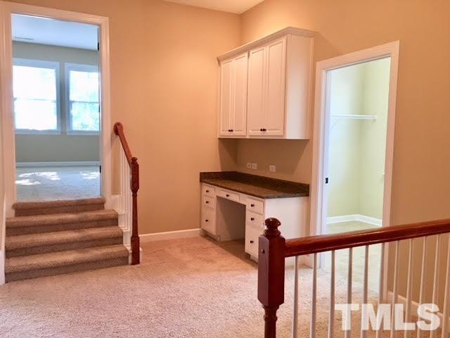 8505 Stonechase Drive Raleigh, NC 27613 - Photo 11 of 24 a view of kitchen and utility room