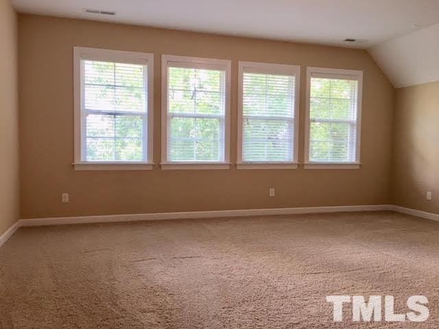 8505 Stonechase Drive Raleigh, NC 27613 - Photo 17 of 24 an empty room with a window