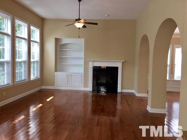 8505 Stonechase Drive Raleigh, NC 27613 - Photo 8 of 24 a view of livingroom and hardwood floor