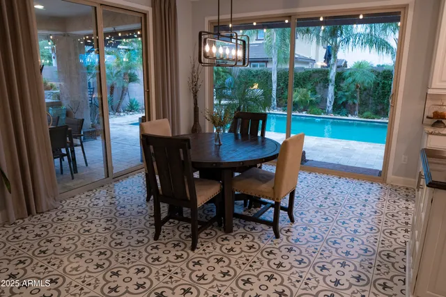 a view of a dining room with furniture window and outside view