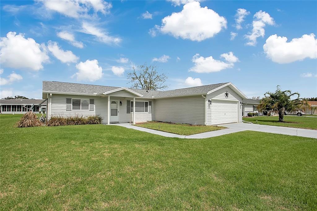10475 Southeast 178th Street Summerfield, FL 34491 - Photo 1 of 1 a view of a house with a backyard