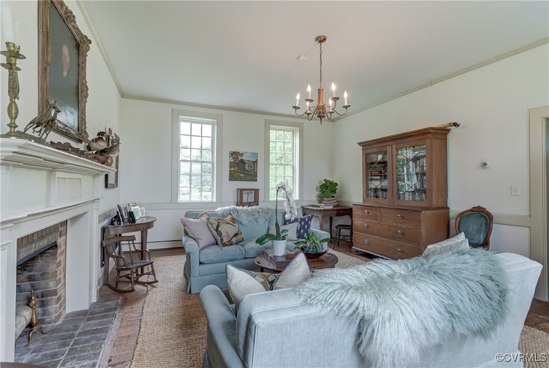 23390 Mt Cloud Road Bowling Green, VA 22427 - Photo 11 of 50 a bedroom with a large bed and a fireplace