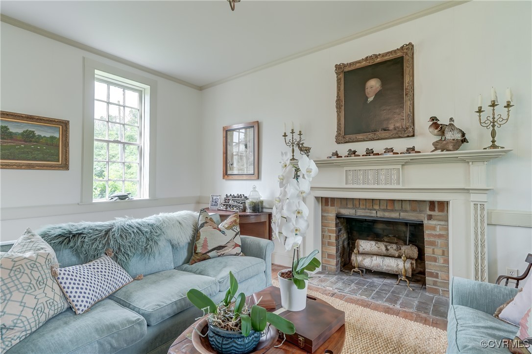 23390 Mt Cloud Road Bowling Green, VA 22427 - Photo 12 of 50 a living room with furniture and a fireplace