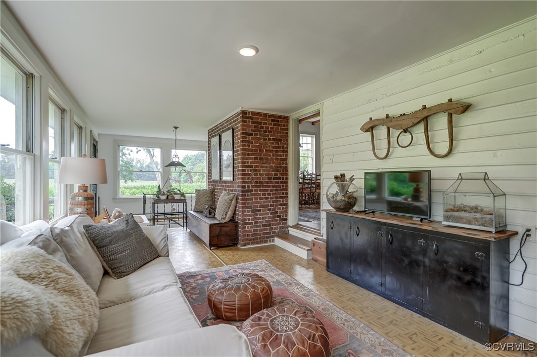 23390 Mt Cloud Road Bowling Green, VA 22427 - Photo 20 of 50 a living room with furniture and a large window