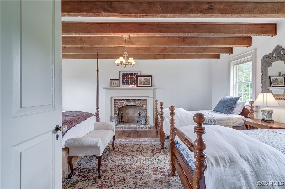 23390 Mt Cloud Road Bowling Green, VA 22427 - Photo 24 of 50 a living room with furniture and a fireplace