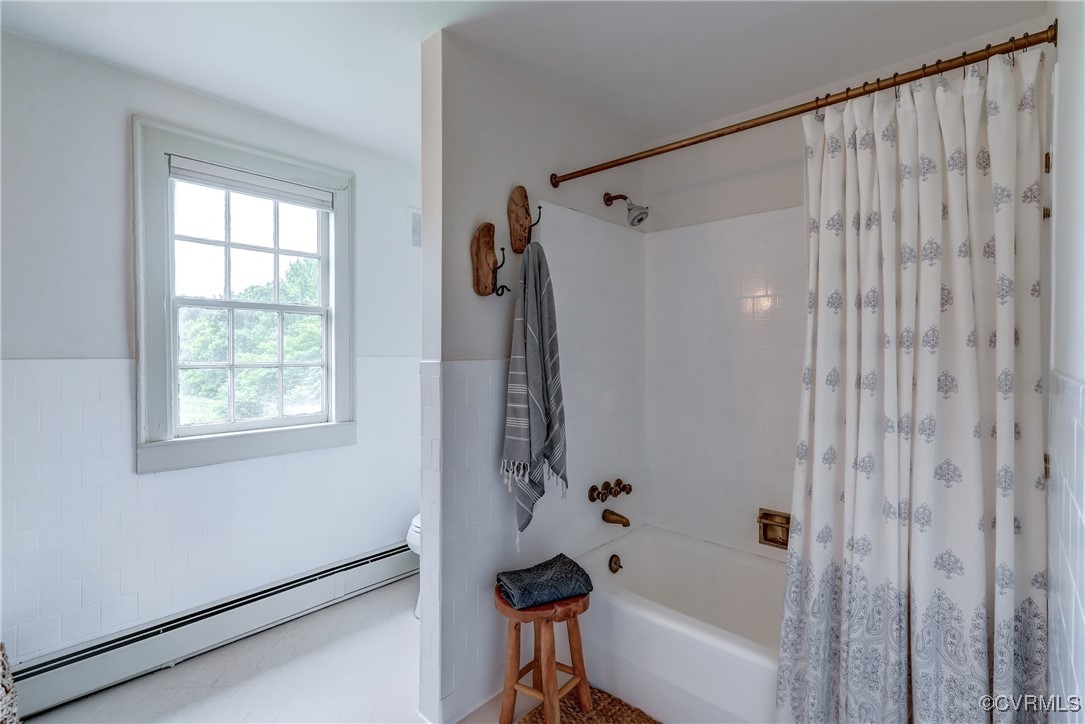 23390 Mt Cloud Road Bowling Green, VA 22427 - Photo 26 of 50 a bathroom with a bathtub and a shower