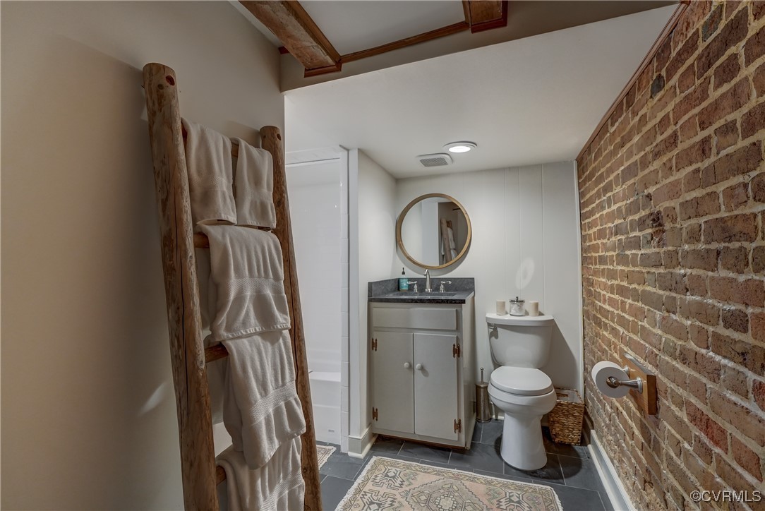 23390 Mt Cloud Road Bowling Green, VA 22427 - Photo 32 of 50 a bathroom with a toilet and a sink
