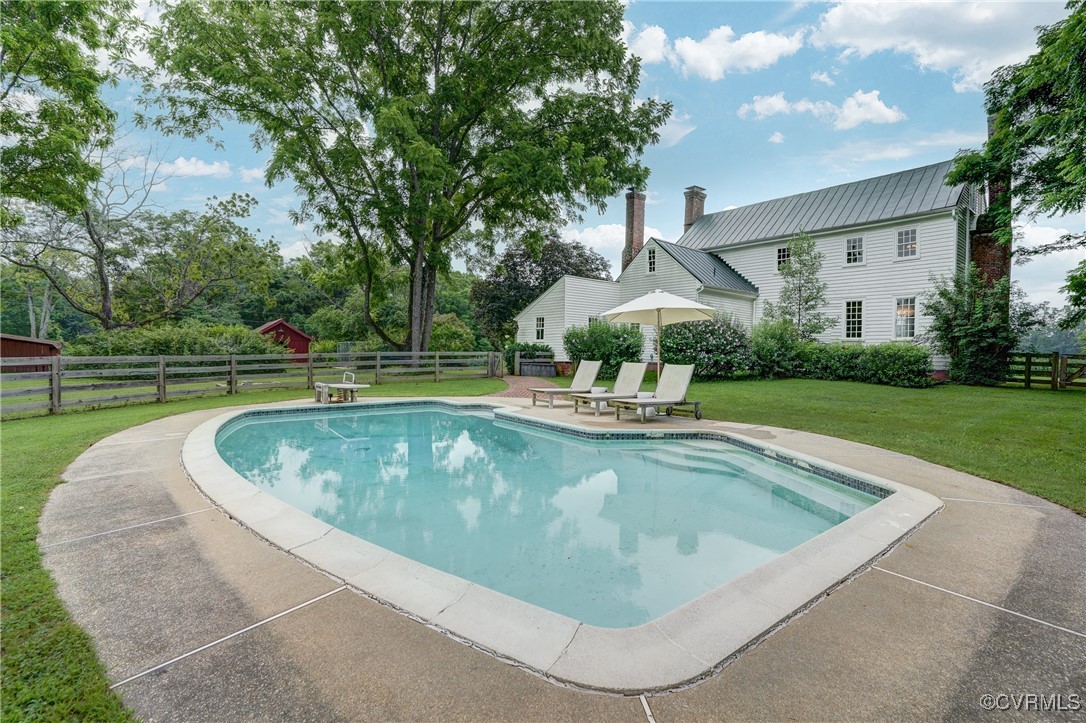 23390 Mt Cloud Road Bowling Green, VA 22427 - Photo 5 of 50 a view of a swimming pool with a yard and sitting space