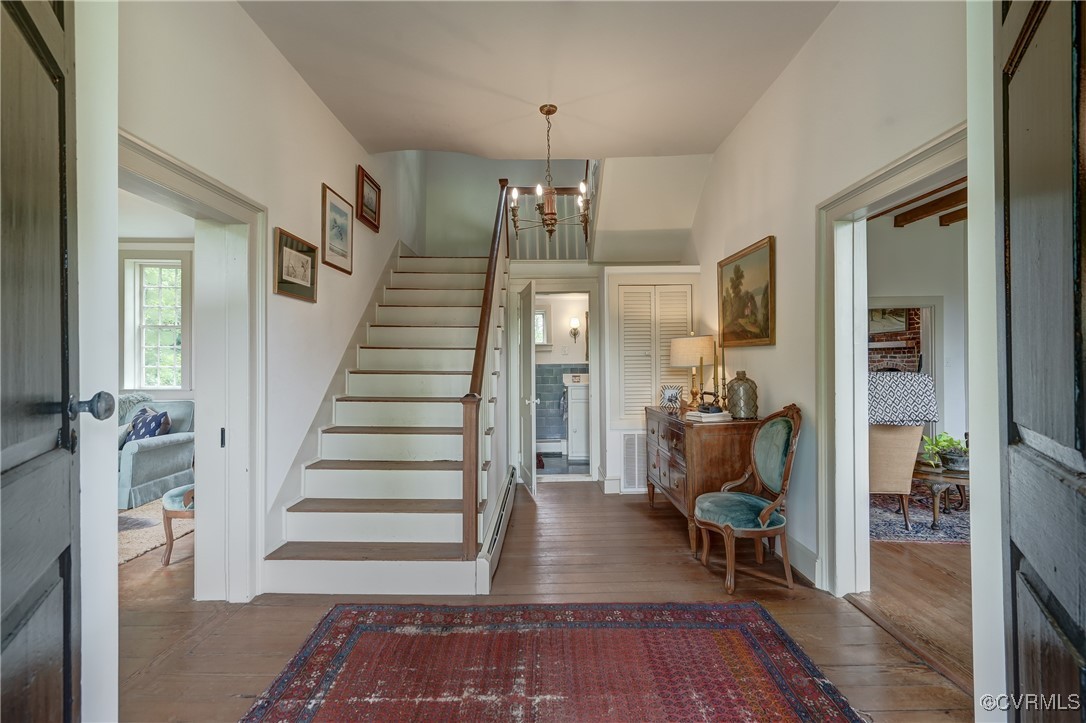 23390 Mt Cloud Road Bowling Green, VA 22427 - Photo 9 of 50 a view of a hallway view with wooden floor and staircase